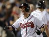 Atlanta Braves starting pitcher Tim Hudson smiles after hitting a home run in the fifth inning of a baseball game against the Washington Nationals on Tuesday, April 30, 2013, in Atlanta. (AP Photo/John Bazemore)