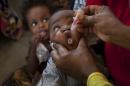 A Somali child receives a polio vaccine.