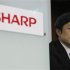 Sharp Corp President Katayama looks on during a news conference in Tokyo