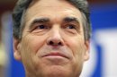 Texas Governor Perry announces he is dropping his run for the Republican U.S. presidential nomination during a news conference in Charleston
