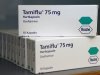 FILE - In this April 28, 2009 file photo packages of the medicine Tamiflu by Swiss pharmaceutical company Roche are seen  in Stuttgart, southern Germany. A leading British medical journal is asking the drug maker Roche to release all its data on Tamiflu, claiming there is no evidence the drug can actually stop the flu.  The drug has been stockpiled by dozens of governments worldwide in case of a global flu outbreak and was widely used during the 2009 swine flu pandemic. On Monday Nov. 12, 2012, one of the researchers linked to the BMJ called for European governments to sue Roche.  (AP Photo/Thomas Kienzle, File)