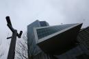Birds fly past the new ECB headquarters in Frankfurt