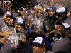 Players from the Dominican Republic celebrate with the trophy after they defeated Puerto Rico in the final to win the World Baseball Classic in San Francisco