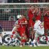 Czech Republic's Plasil shoots a free kick towards Russia's defensive barrier during their Group A Euro 2012 soccer match at the City Stadium in Wroclaw