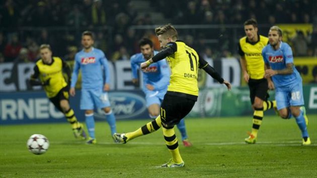 Marco Reus scores a penalty for Borussia Dortmund against Napoli (Reuters)