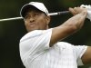 Tiger Woods hits from the eighth tee during the third round of The Players championship golf tournament at TPC Sawgrass, Saturday, May 11, 2013 in Ponte Vedra Beach, Fla. (AP Photo/Gerald Herbert)