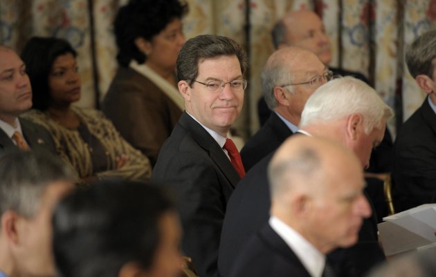 Kansas Gov. Sam Brownback, and fellow governors, wait for President Barack Obama to speak before the National Governors Association, Monday, Feb. 27, 2012, in the State Dining Room of the White House in Washington. (AP Photo/Susan Walsh)