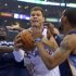 Los Angeles Clippers forward Blake Griffin, middle, drives between Memphis Grizzlies forward Zach Randolph, left, and Mike Conley during the first half of Game 2 of a first-round NBA basketball playoff series, Monday, April 22, 2013, in Los Angeles.  (AP Photo/Mark J. Terrill)