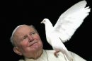 File photo of John Paul II at his private apartment at the end of the Sunday Angelus prayer at the Vatican