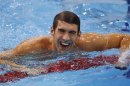 Michael Phelps of the U.S. smiles after winning the men's 4x200m freestyle relay final to get his 19th Olympic medal during the London 2012 Olympic Games at the Aquatics Centre