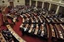Greek parliament lawmakers vote to decide on whether to lift the immunity from prosecution of six lawmakers from the Golden Dawn party on October 16, 2013 in Athens