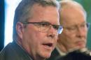 FILE - This March 19, 2014 file photo shows former Florida Gov. Jeb Bush speaking at an education forum in Nashville, Tenn. Battling 