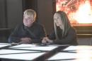 This photo released by Lionsgate shows, Philip Seymour Hoffman, left, as Plutarch Heavensbee and Julianne Moore as President Coin in a scene from the film, "The Hunger Games: Mockingjay - Part 1." The movie releases on Nov. 21, 2014. (AP Photo/Lionsgate, Murray Close)