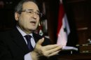 Syrian deputy foreign minister Faisal Muqdad answers AFP journalists' questions in Damascus, September 4, 2013