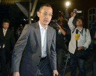 Professor Shinya Yamanaka arrives at Kyoto University for a news conference in Kyoto, western Japan Monday, Oct. 8, 2012, after the announcement in Stockholm by Nobel Prize committee. British researcher John Gurdon and Yamanaka of Japan won this year's Nobel Prize in physiology or medicine on Monday for discovering that mature, specialized cells of the body can be reprogrammed into stem cells - a discovery that scientists hope to turn into new treatments. (AP Photo/Kyodo News) JAPAN OUT, MANDATORY CREDIT, NO LICENSING IN CHINA, FRANCE, HONG KONG, JAPAN AND SOUTH KOREA
