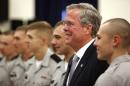 Republican presidential candidate, former Florida Gov. Jeb Bush, poses with Citadel cadets after giving a speech on foreign policy and national defense, Wednesday, Nov. 18, 2015, on the campus of The Citadel in Charleston, S.C. (AP Photo/Mic Smith)