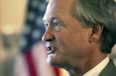 FILE - In this May 29, 2012 file photo, Rhode Island Gov. Lincoln Chafee speaks at the Statehouse in Providence, R.I. Chafee, an independent, is joining the Democratic Party ahead of his bid for a second term, two Democratic officials said Thursday, May 29, 2013. He served in the U.S. Senate as a Republican but left the GOP in 2007. (AP Photo/Steven Senne, File)