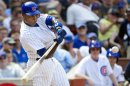 Chicago Cubs' Alfonso Soriano hits a two-run home run scoring Bryan LaHair during the sixth inning of a baseball game against the San Diego Padres, Monday, May 28, 2012, in Chicago. (AP Photo/Brian Kersey)