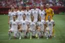 The England squad poses for a photo prior to a quarterfinal against Canada in the Women's World Cup soccer tournament, Saturday, June 27, 2015, in Vancouver, British Columbia, Canada. (Jonathan Hayward/The Canadian Press via AP)