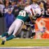 Miami Dolphins safety Reshad Jones causes Buffalo Bills wide receiver Donald Jones to fumble in the fourth quarter of their NFL football game in Orchard Park, New York