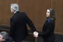 FILE - In this Jan. 12, 2015 file photo, Oregon Gov. John Kitzhaber escorts his fiancee, Cylvia Hayes, onto the House floor before he is sworn in for an unprecedented fourth term as Governor in Salem, Ore. Kitzhaber announced his resignation Friday, Feb. 13, 2015, amid allegations Hayes used her relationship with him to enrich herself. (AP Photo/Don Ryan, file)