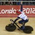 Britain's Chris Hoy celebrates after their track cycling men's team sprint finals at the Velodrome during the London 2012 Olympic Games