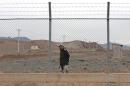Iranian soldier stands guard inside Natanz uranium enrichment facility