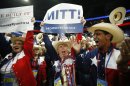 Texas delegates cheer as Mitt Romney is nominated for the Office of the President of the United States at the Republican National Convention in Tampa, Fla., on Tuesday, Aug. 28, 2012. (AP Photo/Jae C. Hong)