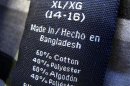 Clothing made in Bangladesh is shown after purchase from a Walmart store in California