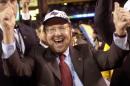 FILE - In this Jan. 26, 2003 file photo, Tampa Bay Buccaneers owner Malcolm Glazer celebrates the Bucs' 48-21 victory over the Oakland Raiders in Super Bowl XXXVII in San Diego. Glazer, the self-made billionaire who owned the NFL's Tampa Bay Buccaneers and English soccer's Manchester United, has died. He was 85. The Bucs said Glazer died Wednesday, May 28, 2014. (AP Photo/Dave Martin, File)