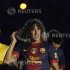 Barcelona's captain Puyol gestures during the presentation ceremony of his team in Barcelona