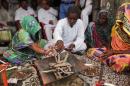 People take part in a religion conversion ceremony in Uttar Pradesh