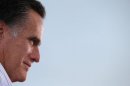 Mitt Romney speaks during a victory rally at Pier Park on Oct. 5 in St Petersburg, Fla.: Republicans are cheering Romney's move to the center, not because they necessarily agree with his views, but probably because he seems to be gaining an edge over Obama.