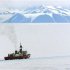 A United States Coast Guard icebreaker works in McMurdo Sound keeping a channel free for supply ship..