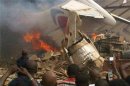 Plane crashes into building in Nigeria
