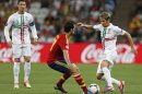Portugal's Fabio Coentrao tries to go past Spain's Alvaro Arbeloa during the Euro 2012 soccer championship semifinal match between Spain and Portugal in Donetsk, Ukraine, Wednesday, June 27, 2012. (AP Photo/Matthias Schrader)