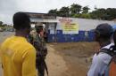 Liberian soldiers check people travelling in Bomi County