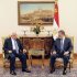 In this photo, released by the Egyptian Presidency, Palestinian President Mahmoud Abbas, left, meets with  Egyptian President Mohammed Morsi, right, in Cairo Egypt, Tuesday, Nov. 13, 2012. In a meeting in Cairo Tuesday with Western-backed Palestinian President Mahmoud Abbas, Morsi expressed his "full support" for Palestinian plans to seek nonmember state status at the United Nations.(AP Photo/Egyptian Presidency)