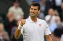 Serbia's Novak Djokovic celebrates at Wimbledon, on June 29, 2016