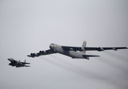 A U.S. Air Force B-52 flies over Osan Air Base in Pyeongtaek
