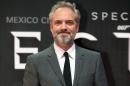 FILE - In this Monday, Nov. 2, 2015 file photo, director Sam Mendes poses for photographers at the regional premiere of the latest James Bond film, "Spectre," at the National Auditorium in Mexico City. Sam Mendes, the acclaimed British director of "Skyfall" and "Spectre", said Saturday, May 28, 2016 he will not direct the next installment in the James Bond series. "It was an incredible adventure, I loved every second of it," Mendes said of his five years working on the thriller franchise. "But I think it's time for somebody else." (AP Photo/Rebecca Blackwell, file)
