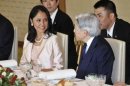 Peruvian President Ollanta Humala's wife Nadine Heredia speaks with Japanese Emperor Akihito in Tokyo