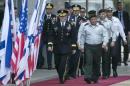 General Martin E. Dempsey is escorted by Israel's Chief of Staff in Tel Aviv