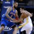 Golden State Warriors' Klay Thompson, right, drives against the New York Knicks' Tyson Chandler (6) during the first half of an NBA basketball game Monday, March 11, 2013, in Oakland, Calif. (AP Photo/Ben Margot)