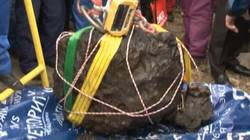 Météorite  Le-morceau-de-la-meteorite-de-tcheliabinsk-extrait-du-lactcherbakoul-pese-570-kilogrammes_63271_w250