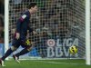 FC Barcelona's Lionel Messi, from Argentina, scores his second goal against Atletico Madrid during a Spanish La Liga soccer match at the Camp Nou stadium in Barcelona, Spain, Sunday, Dec. 16, 2012, (AP Photo/Bernat Armangue)