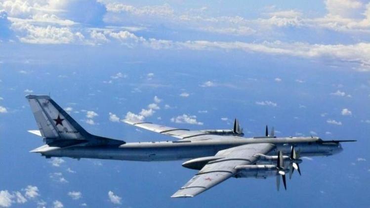 A Russian TU-95 bomber flies in airspace near the isle of Okinoshima in western Japan on August 22, 2013