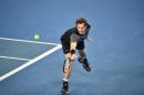 Britain's Andy Murray plays a backhand return during his men's singles match against Portugal's Joao Sousa on day six of the 2016 Australian Open tennis tournament in Melbourne on January 23, 2016