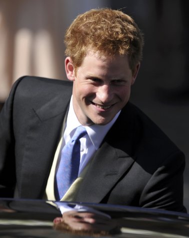 FILE-- In this July 30 file photo Britain's Prince Harry leaves after the wedding between Zara Phillips and England rugby star Mike Tindall in Edinburgh, Scotland. Prince Harry sipped a Corona during a Cirque du Soleil show and rented a Harley during a weekend trip to Las Vegas. The vacation came as the prince is training on helicopters at an Air Force site near Gila Bend, Ariz. (AP Photo/Dylan Martinez, Pool, File)