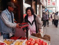 FIEL - In this May 25, 1997 file photo, Phan Thi Kim Phuc shops in the Chinatown district of Toronto. Now a permanent resident of Canada, Kim Phuc, was first seen in a photograph as a terrified 9-year-old running down a South Vietnamese country road after a napalm attack on June 8, 1972. (AP Photo/Nick Ut)